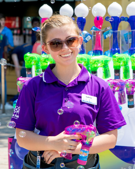 Cedar Fair Employee in Purple Polo